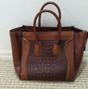 Elegant Brown Leather Tote with Winged Design